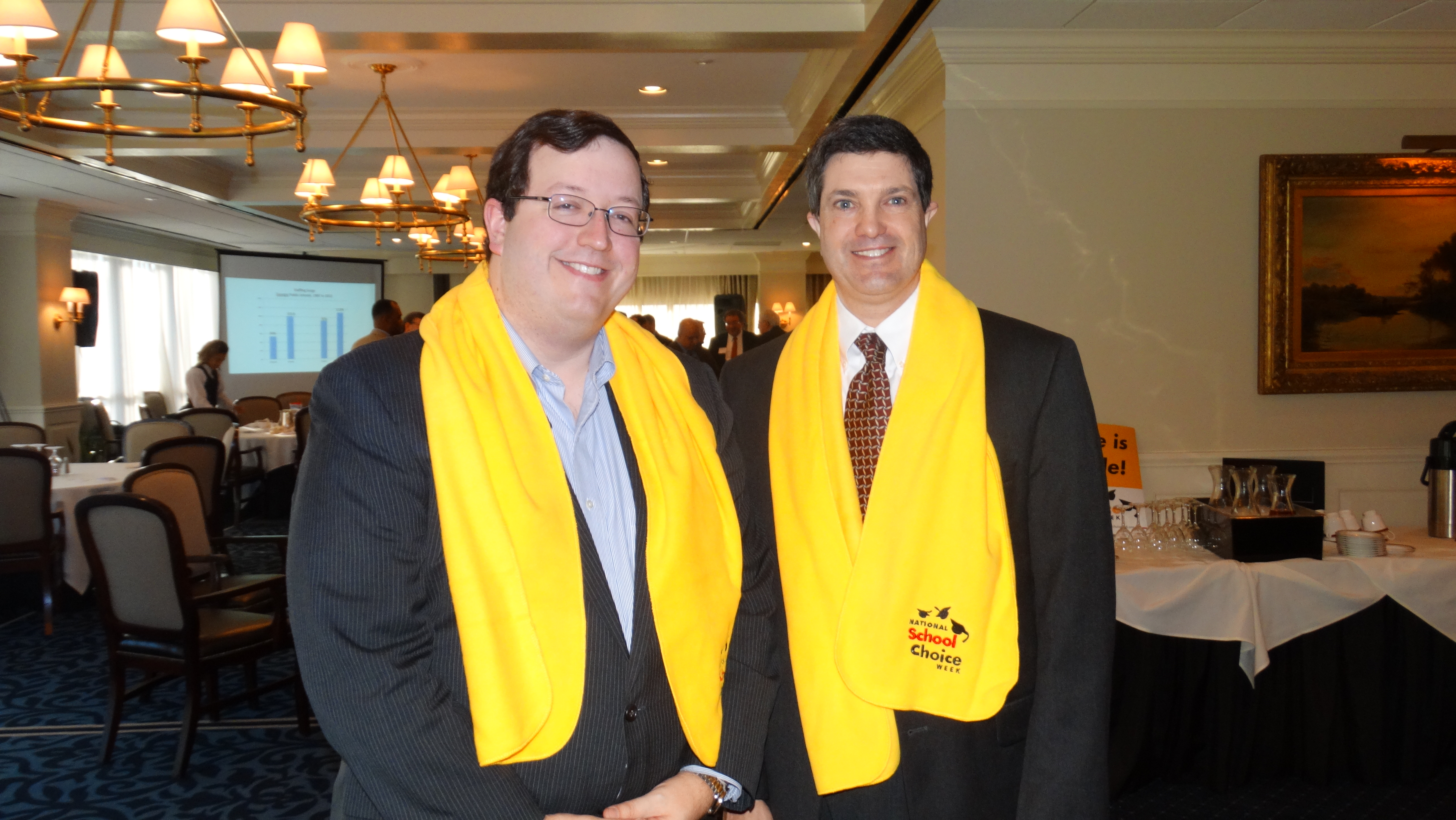 Georgia State Senator Josh McKoon and Foundation President Kelly McCutchen wear their National School Choice Week "woobie" at the Foundation's annual event on January 21. 